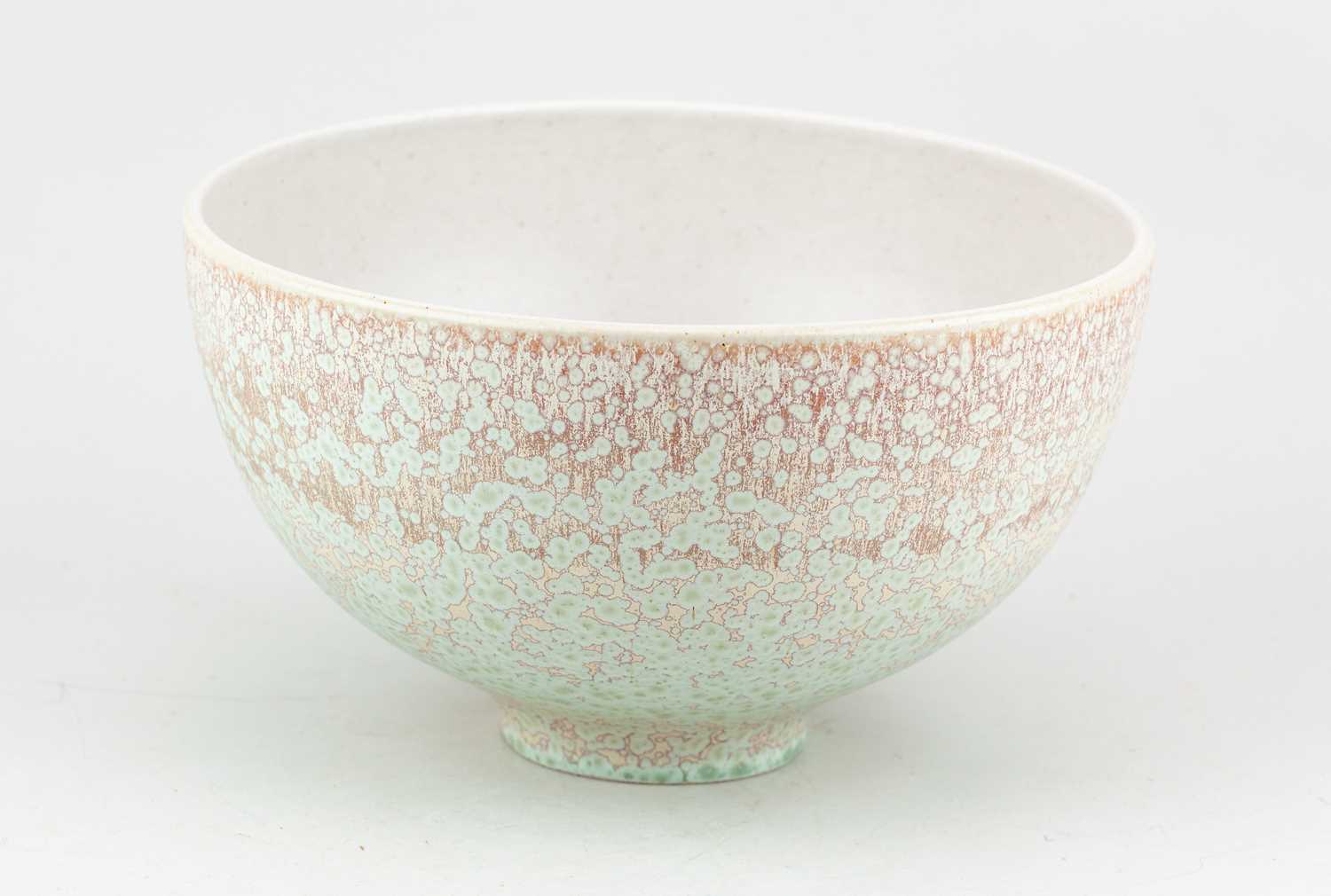 Lot 132 - PETER WILSON; a porcelain bowl covered in...