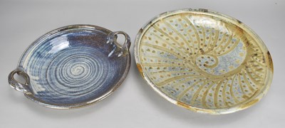 Lot 806 - A large shallow stoneware dish with radiating...