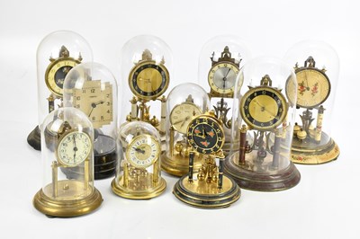 Lot 324 - TEMPEX; an electric mantel clock, the applied...