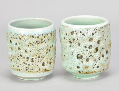 Lot 394 - JOHN SCOTT; a pair of porcelain yunomi covered...