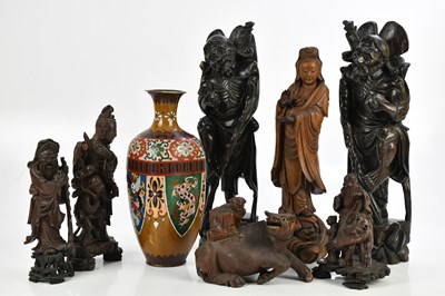 Lot 1079 - A collection of Chinese root wood figures...