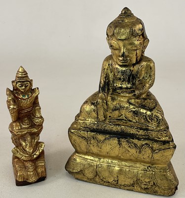 Lot 372 - An early 20th century gilt wood Buddha on...