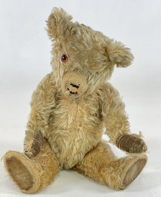 Lot 201 - A vintage gold plush teddy bear with velvet...