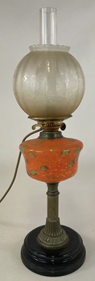 Lot 720 - A late Victorian oil lamp with brass column,...