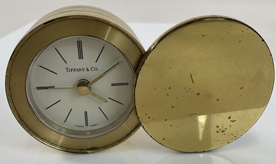 Lot 701 - TIFFANY & CO; a polished brass travel...