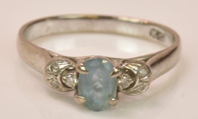 Lot 633 - A 14ct white gold aquamarine and diamond ring,...