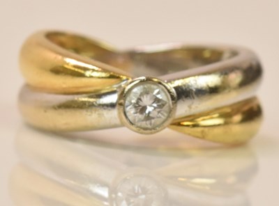 Lot 585 - An 18ct yellow and white gold double band set...