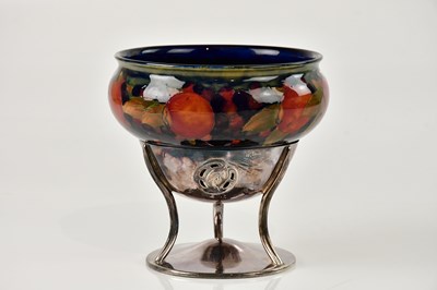 Lot 62 - WILLIAM MOORCROFT; an unusual bowl on stand,...