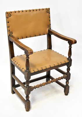 Lot 123 - A 1930s oak carver dining chair upholstered...