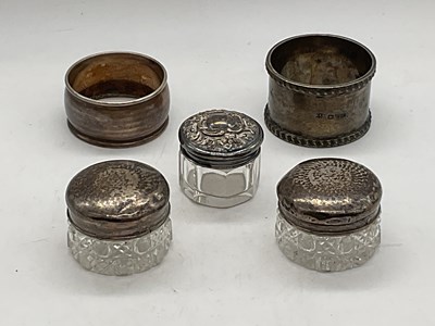 Lot 566 - A George V hallmarked silver napkin ring,...