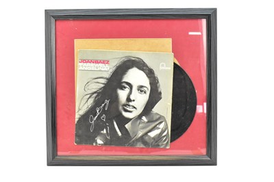 Lot 473 - JOAN BAEZ; a framed display featuring the...