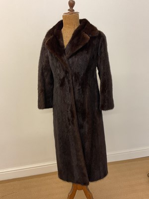 Lot 138 - A full length dark brown mink coat with 3/4...