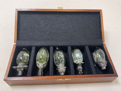 Lot 356 - NGWENYA GLASS; a boxed set of five pewter...