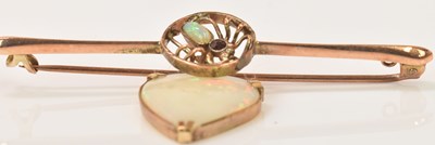 Lot 627 - A 9ct yellow gold opal set brooch, centred...