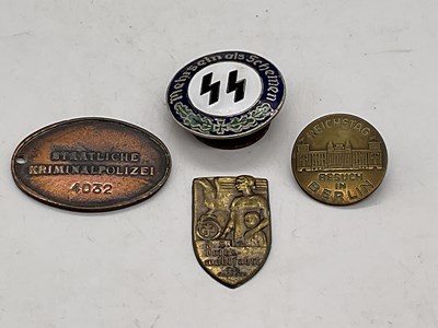 Lot 105 - Four badges/plaques relating to WWII and...