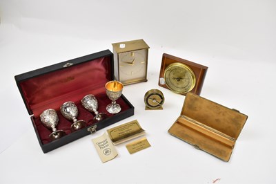 Lot 354 - A Garrard clock, a cased set of four pewter...