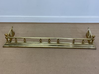 Lot 234 - A brass fireplace fender, height 18cm, width...