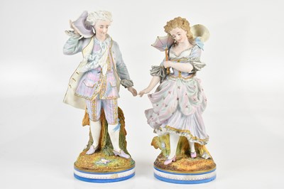 Lot 469 - A pair of Continental figures, male and female,...