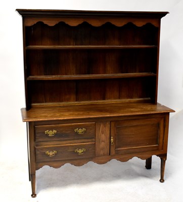 Lot 56 - A Georgian-style oak dresser with enclosed...