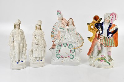 Lot 459 - A group of four Staffordshire figures...