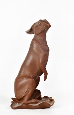 Lot 187 - MEISSEN; a stoneware model of a hare sitting...