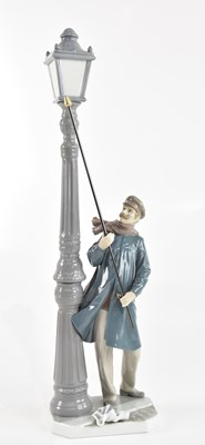 Lot 472 - LLADRÓ; a large model of 'The Lamplighter',...