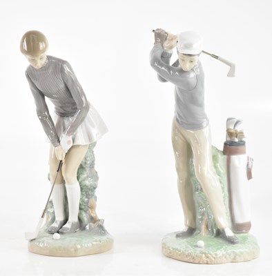 Lot 473 - LLADRÓ; a model of a male and female golfer,...