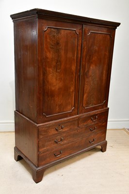 Lot 147 - A 19th century mahogany press cupboard, with...