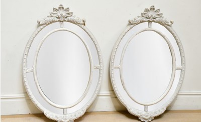 Lot 11 - A pair of French style grey painted oval wall...