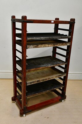 Lot 156 - A vintage stained pine metal-bound trolley...