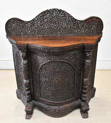 Lot 117 - A late 19th century Burmese carved hardwood...