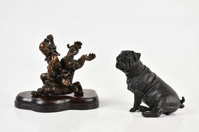 Lot 1393 - A modern bronze figure of a seated pug with...