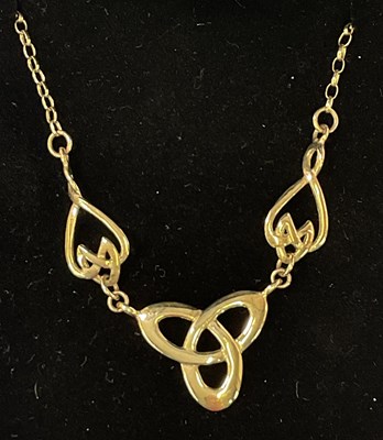 Lot 617 - CELTIC GOLD; a 9ct yellow gold necklace with...