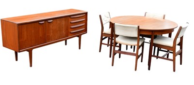 Lot 46 - A mid century teak dining suite comprising...