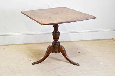 Lot 154 - A 19th century oak tilt-top tripod table with...