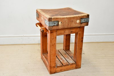 Lot 224 - A vintage metal bound butcher's block on pine...