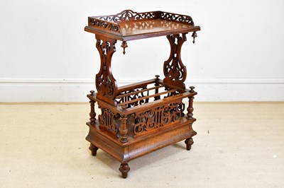 Lot 87 - A Victorian walnut Canterbury whatnot, with...