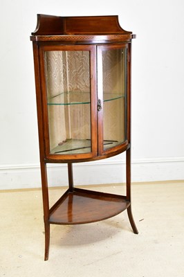 Lot 197 - An Edwardian inlaid mahogany freestanding...