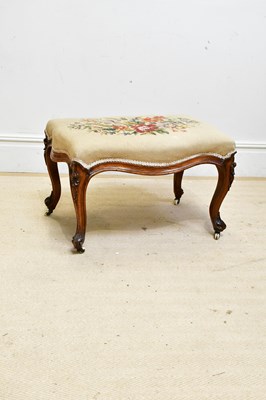 Lot 150 - A Victorian carved walnut serpentine stool,...