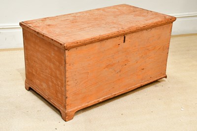 Lot 244 - An old pine blanket chest, the hinged cover...