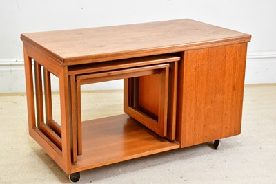 Lot 63 - TRISTOR; a mid century teak coffee table, with...