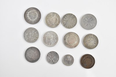 Lot 613 - A collection of foreign coins including a...