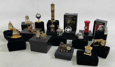 Lot 702 - A quantity of novelty miniature clocks with...