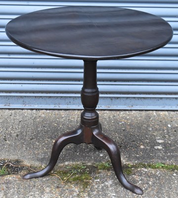 Lot 133 - A 19th century mahogany tilt-top table, the...