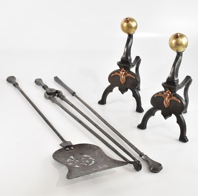 Lot 1360 - A Georgian three piece steel fire implement...