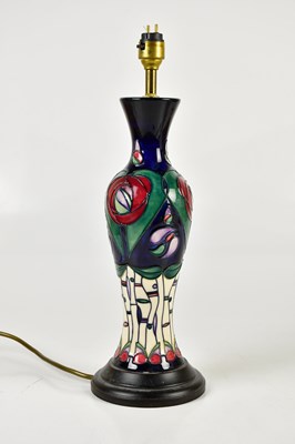 Lot 419 - MOORCROFT; a large pottery table lamp in the...