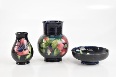 Lot 420 - WALTER MOORCROFT; a bulbous vase in the...