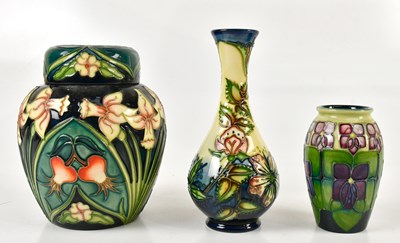 Lot 408 - MOORCROFT; a ginger jar and cover in the...