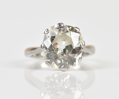 Lot 1264 - An impressive platinum diamond solitaire ring,...