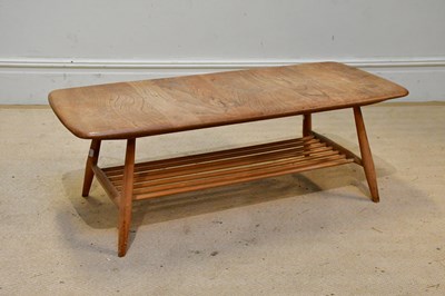 Lot 55 - ERCOL; a rectangular coffee table with spindle...